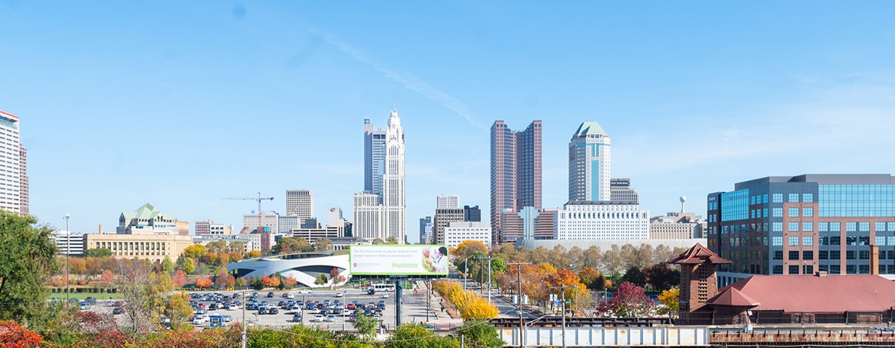 a city skyline with a blue sky